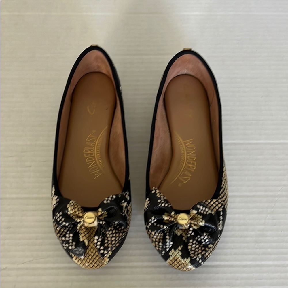 Circus NY Black and Gold Animal Print Flats